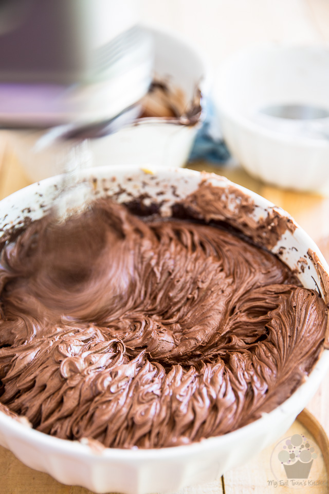 Beat the melted chocolate in - part of step by step instructions to make the most delicious Chocolate Fudge Frosting