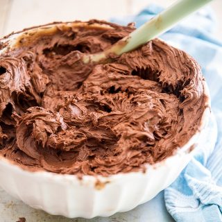 A super rich and intense Chocolate Fudge Frosting that is so insanely delicious and easy to make, you'll never want to go for another recipe ever again!