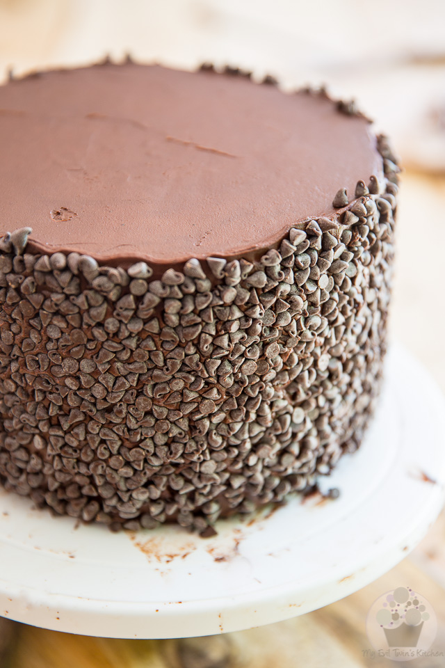 Cover the sides with mini-chocolate chips - part of My Evil Twin's Kitchen's Wicked Windmill Chocolate Cake step-by-step instructions