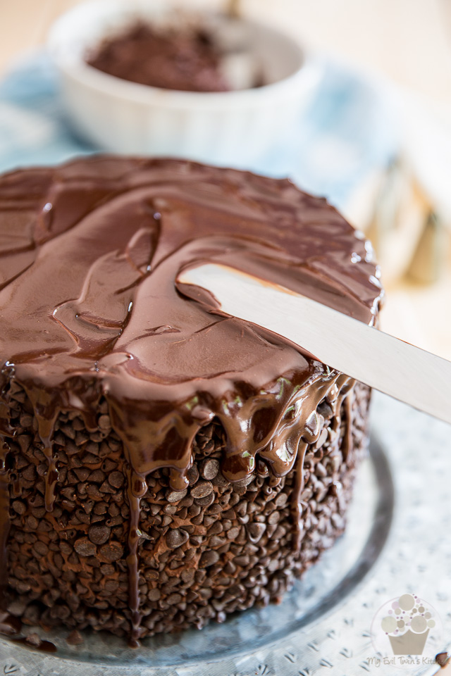 Pouring the ganache over the cake - part of My Evil Twin's Kitchen's Wicked Windmill Chocolate Cake step-by-step instructions