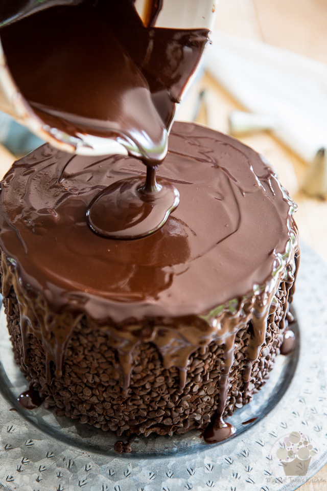 Pouring the ganache over the cake - part of My Evil Twin's Kitchen's Wicked Windmill Chocolate Cake step-by-step instructions