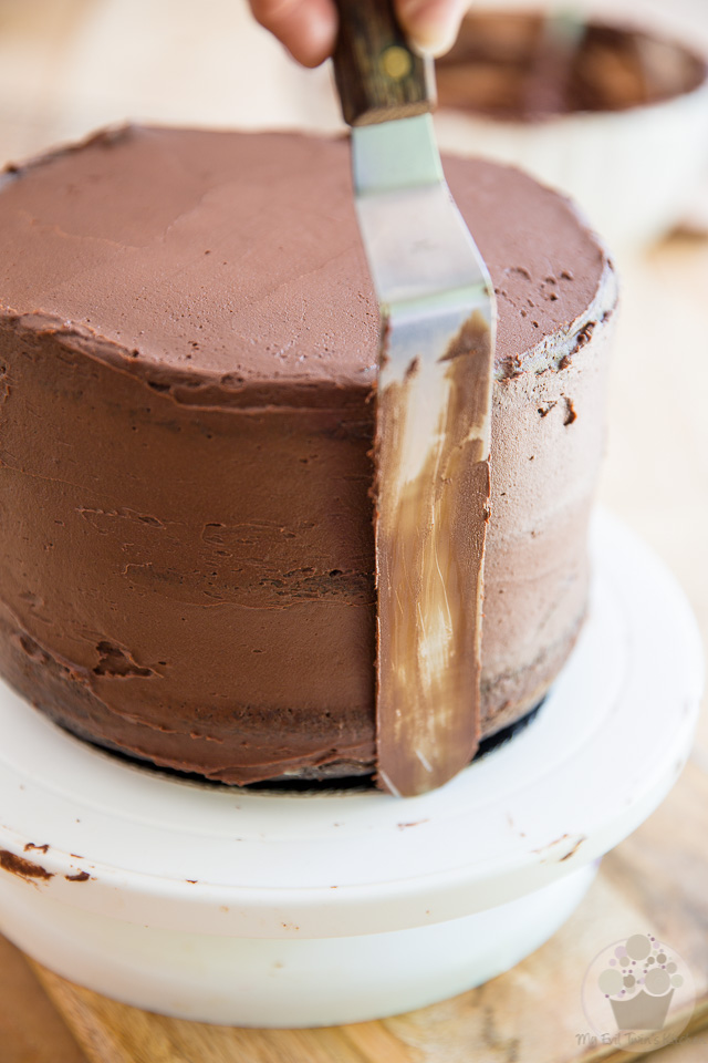 Crumb coat the cake - part of My Evil Twin's Kitchen's Wicked Windmill Chocolate Cake step-by-step instructions