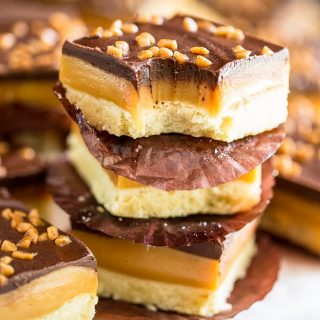 A soft and buttery shortbread cookie topped with a thick layer of creamy, chewy caramel and tasty dark chocolate, these multi millionaire bars will make you feel like you've just won the lottery!