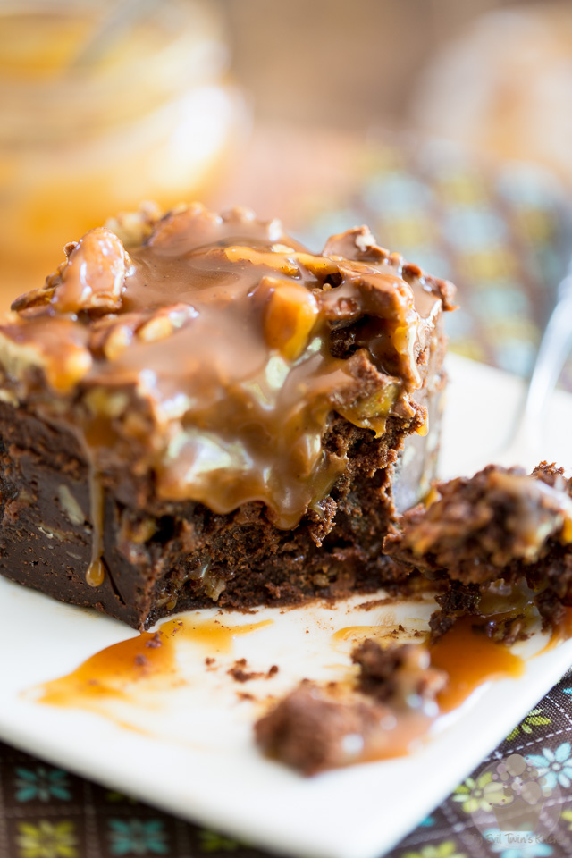 A dense, chewy and intensely chocolatey brownie topped with a delicious salted caramel frosting, stuffed with loads of Turtles minis and pecans and oozing with the most delicious salted caramel sauce, these Turtle Poke Brownies are an experience your taste buds won't soon forget! 