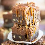 A dense, chewy and intensely chocolatey brownie topped with a delicious salted caramel frosting, stuffed with loads of Turtles minis and pecans and oozing with the most delicious salted caramel sauce, these Turtle Poke Brownies are an experience your taste buds won't soon forget!
