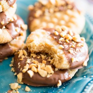 Dangerously chewy and peanut-buttery, these Chocolate Dipped Peanut Butter Cookies are what serious peanut butter lovers' dreams are made of!
