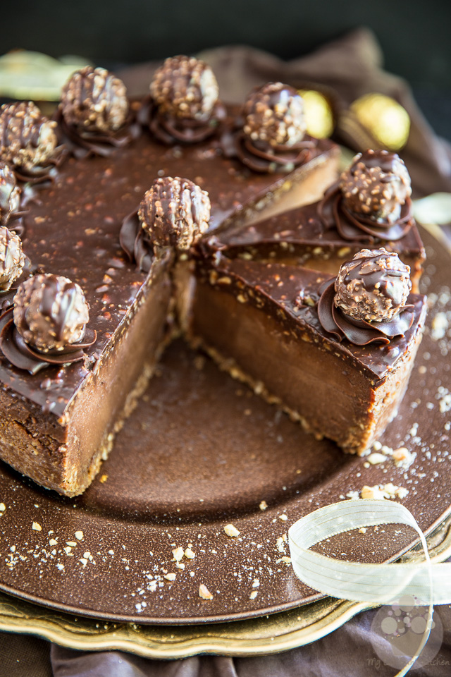 Devilishly rich, creamy, smooth and velvety... just one bite of this Ferrero Rocher Nutella Cheesecake will send you straight to seventh heaven! 