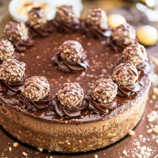 Devilishly rich, creamy, smooth and velvety... just one bite of this Ferrero Rocher Nutella Cheesecake will send you straight to seventh heaven!