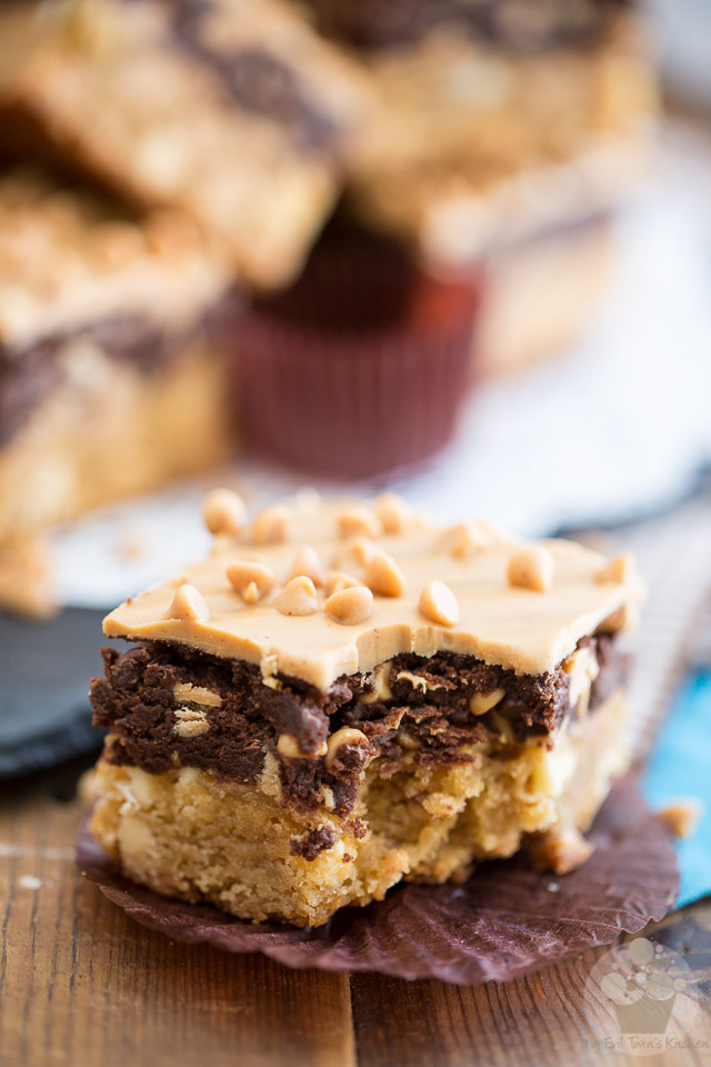 A deliciously chewy peanut butter blondie topped with a thick layer of cookie dough and covered with a delicious melted peanut butter chocolate frosting.