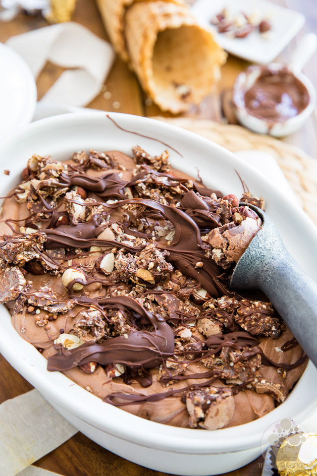 This No Churn Dulce Ferrero Rocher Nutella Ice Cream is wickedly rich and creamy, and loaded with delicious pieces of nuts, chocolate and swirls of frozen Nutella. Heavenly!